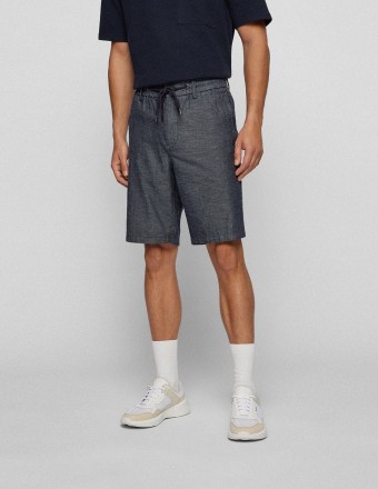 TAPERED FIT SHORTS IN...