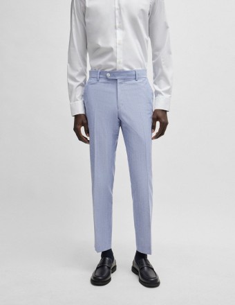 SLIM FIT TROUSERS IN A...