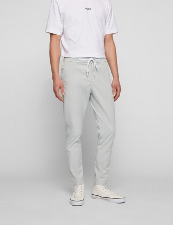 TAPERED-FIT TROUSERS WITH...